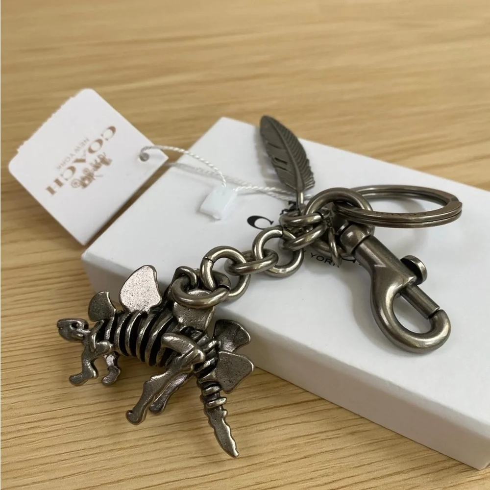 Coach Silver-Tone Stegosaurus & Feather Keyring Charm
